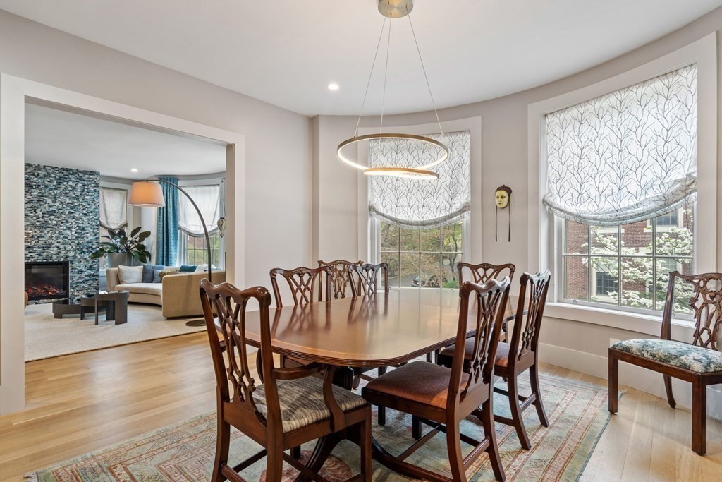 135 Beaconsfield Road, Unit 2 Brookline, MA 02445 - Photo 4 of 33 a view of a dining room with furniture window and wooden floor