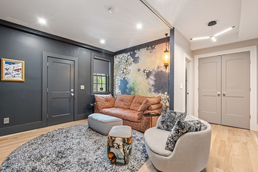 135 Beaconsfield Road, Unit 2 Brookline, MA 02445 - Photo 6 of 33 a living room with furniture and a large window