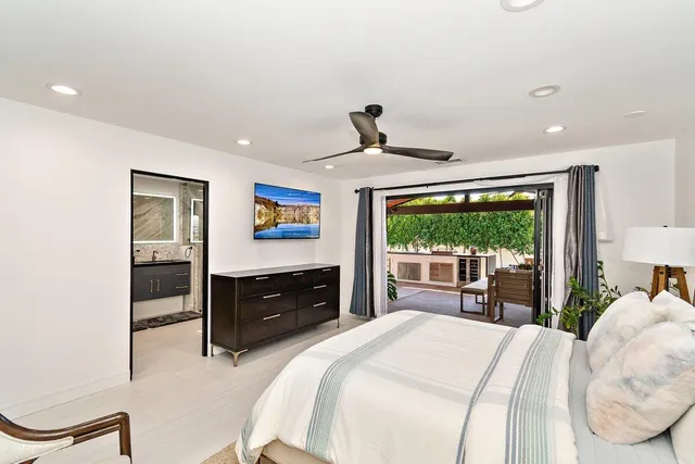 a outdoor dining space with furniture and outdoor view