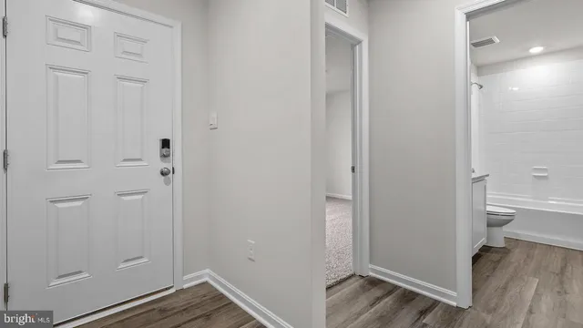 a bathroom with white walls