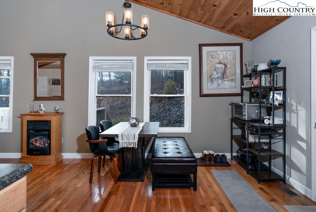 3564 Hickory Nut Gap Road Newland, NC 28657 - Photo 12 of 35 a living room with furniture and a fireplace