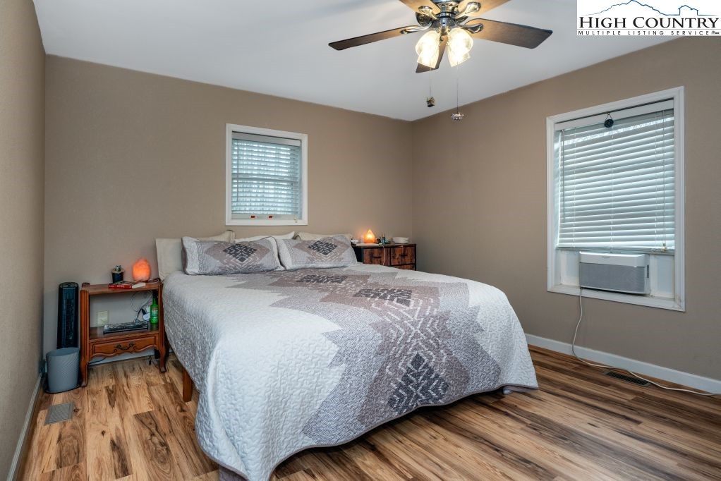 3564 Hickory Nut Gap Road Newland, NC 28657 - Photo 15 of 35 a bedroom with a bed and window