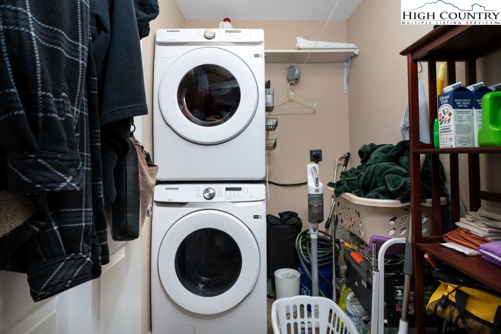 3564 Hickory Nut Gap Road Newland, NC 28657 - Photo 19 of 35 a view of a storage and utility room with washer and dryer