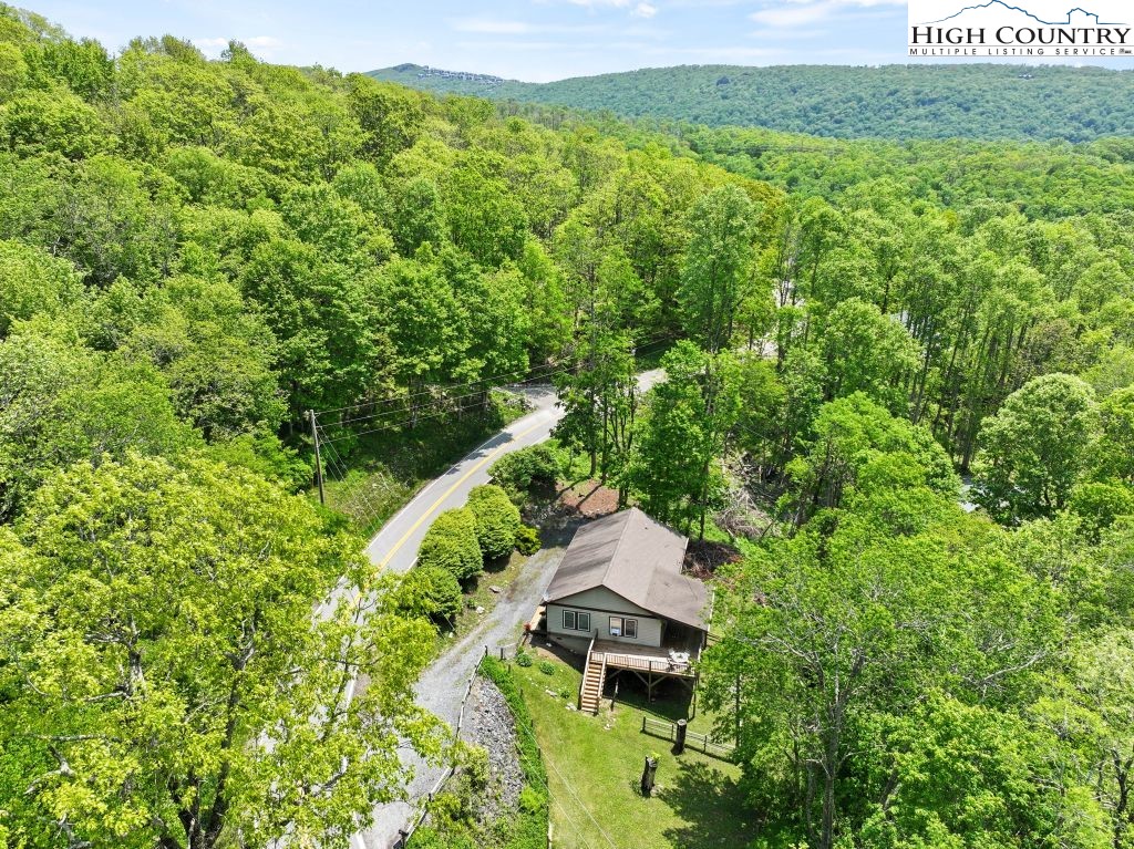 3564 Hickory Nut Gap Road Newland, NC 28657 - Photo 27 of 30 a view of a house with a yard