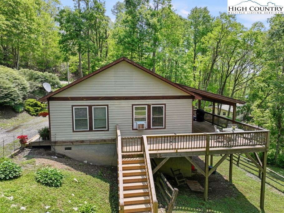 3564 Hickory Nut Gap Road Newland, NC 28657 - Photo 28 of 35 a view of a house with a patio