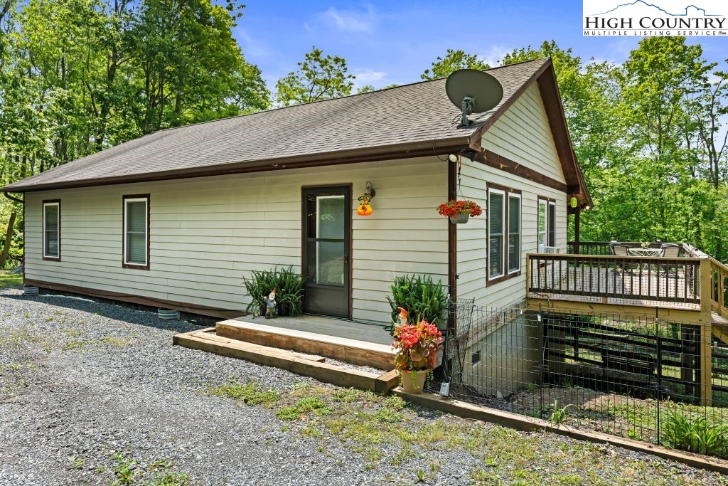 3564 Hickory Nut Gap Road Newland, NC 28657 - Photo 4 of 30 a view of a house with a yard