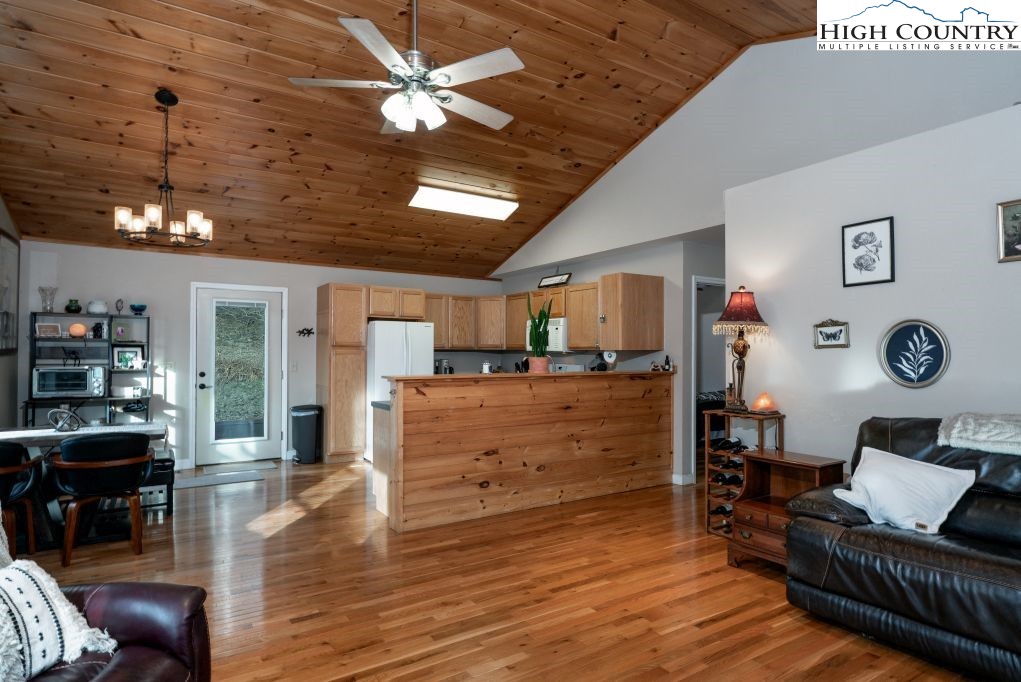3564 Hickory Nut Gap Road Newland, NC 28657 - Photo 8 of 35 a living room with furniture and a wooden floor