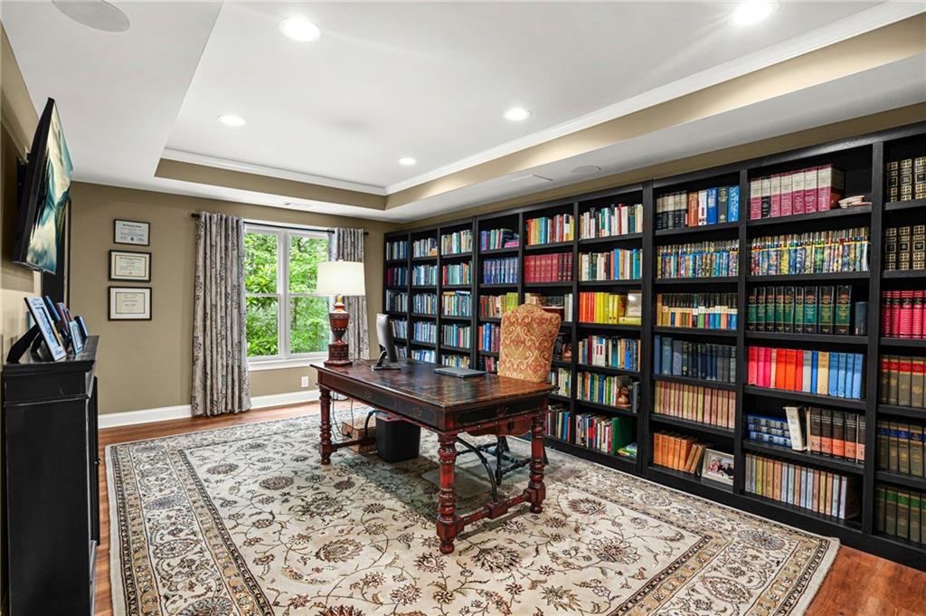 509 Crested Hawk Ridge Canton, GA 30114 - Photo 62 of 89 a reading room with furniture book shelf and a window