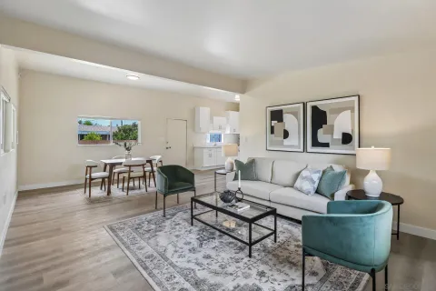 a living room with furniture and a table