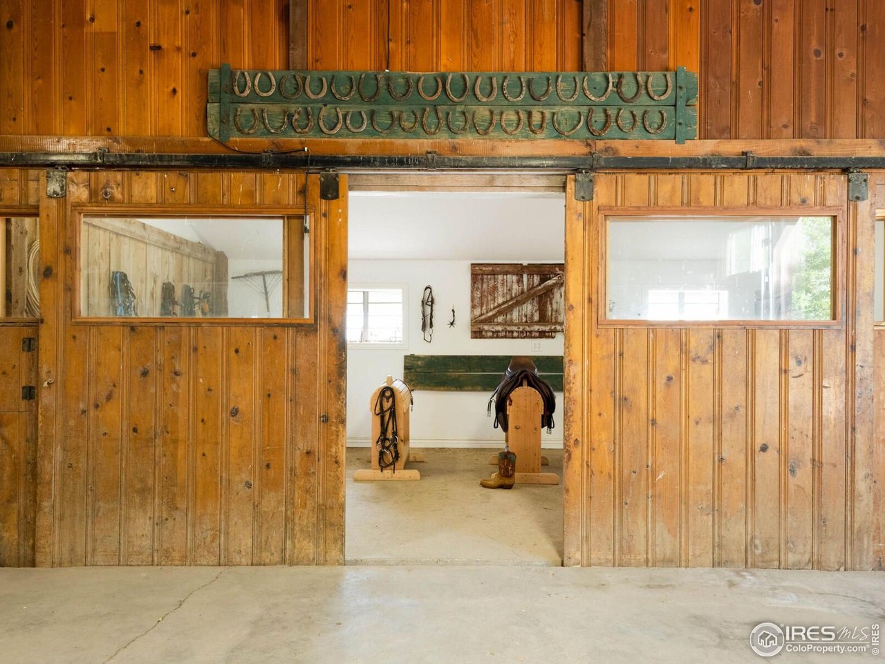 9840 Buckhorn Road Loveland, CO 80538 - Photo 28 of 40 Horse Stables with 6 Box Stalls, Tack Room, Office, Bath and More