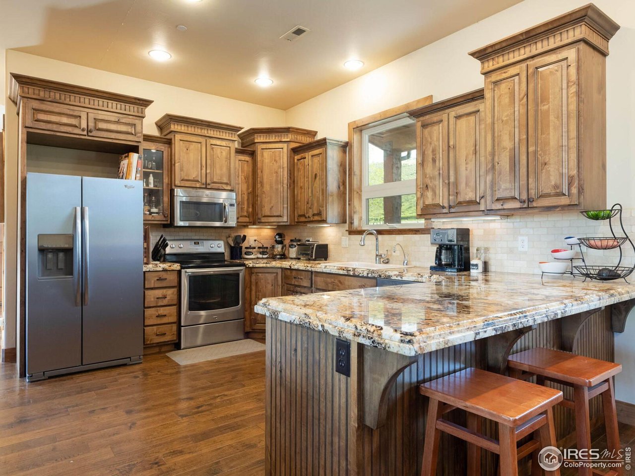 9840 Buckhorn Road Loveland, CO 80538 - Photo 36 of 40 Guest House Kitchen