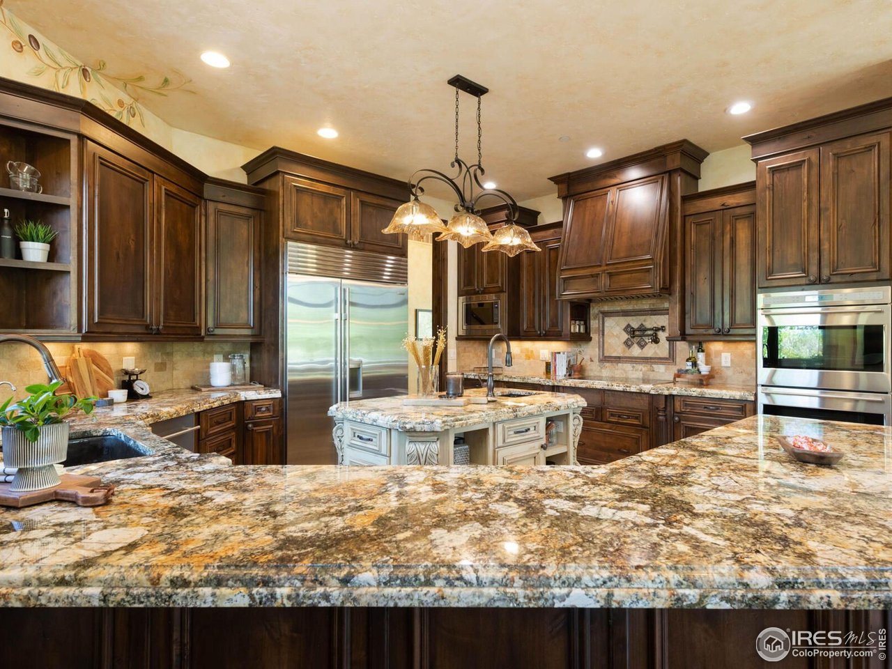 9840 Buckhorn Road Loveland, CO 80538 - Photo 8 of 40 Granite Countertops with Stainless Steel Appliances