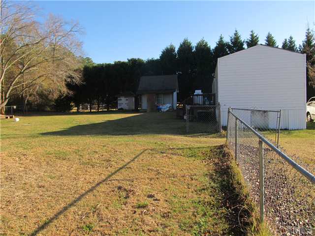 530 Church Road Benson, NC 27504 - Photo 2 of 5 Great investment property or first time home buyers. Fenced yard, detached storage buildings.