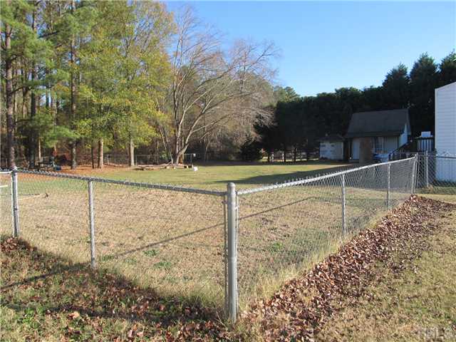 530 Church Road Benson, NC 27504 - Photo 5 of 5 Fenced yard with detached storage.