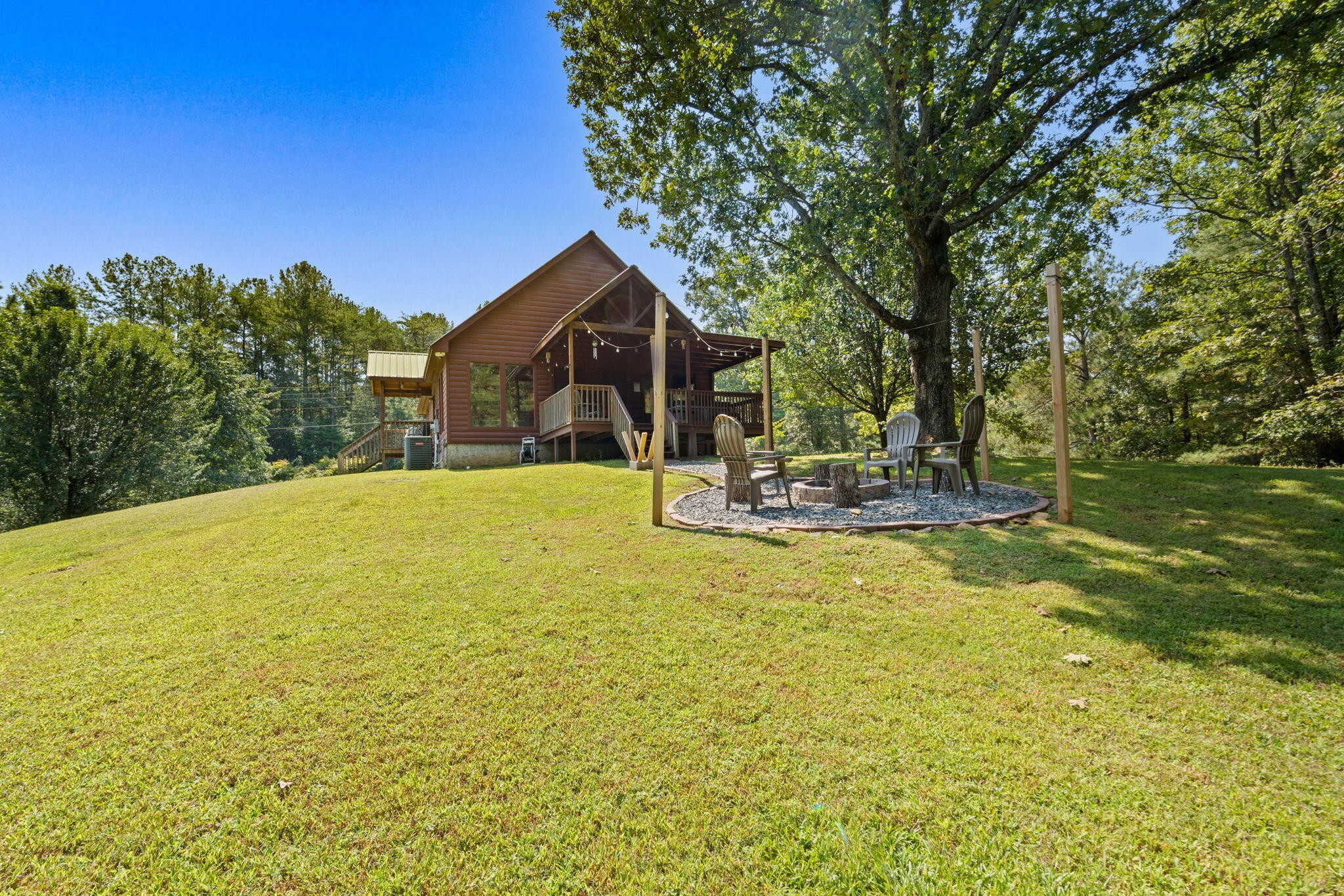 947 Belltown Road Copperhill, TN 37317 - Photo 22 of 26 a view of a house with a yard