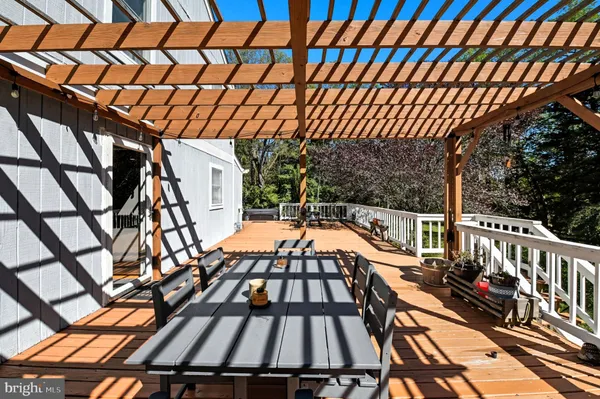 a view of swimming pool with a patio