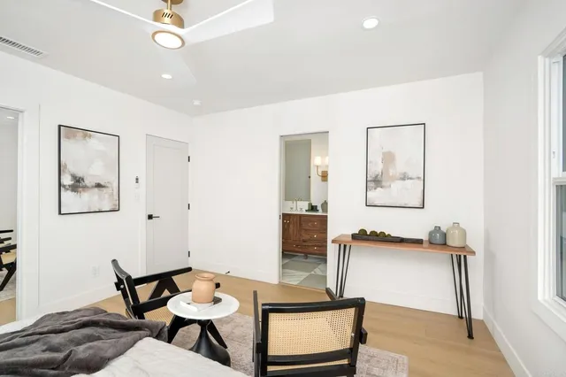a living room with furniture and a table