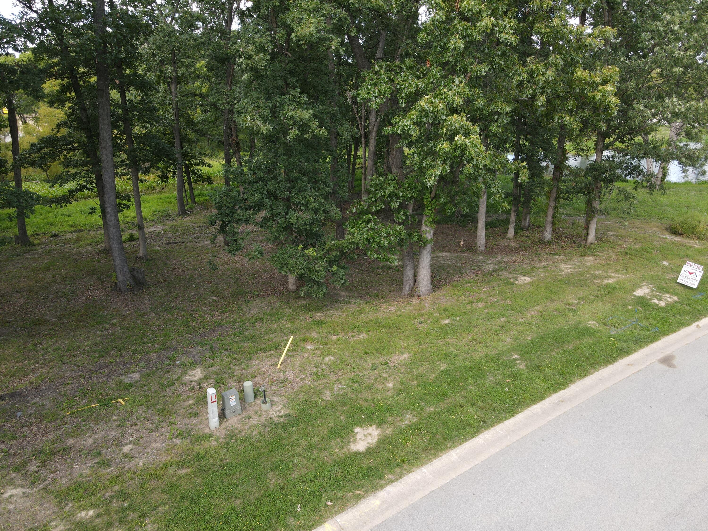 735 Druim Trail Crown Point, IN 46307 - Photo 8 of 14 a backyard of a house with lots of green space