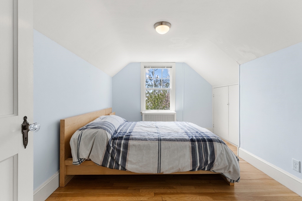 71 Woodland Road Malden, MA 02148 - Photo 31 of 41 a bedroom with a bed and window