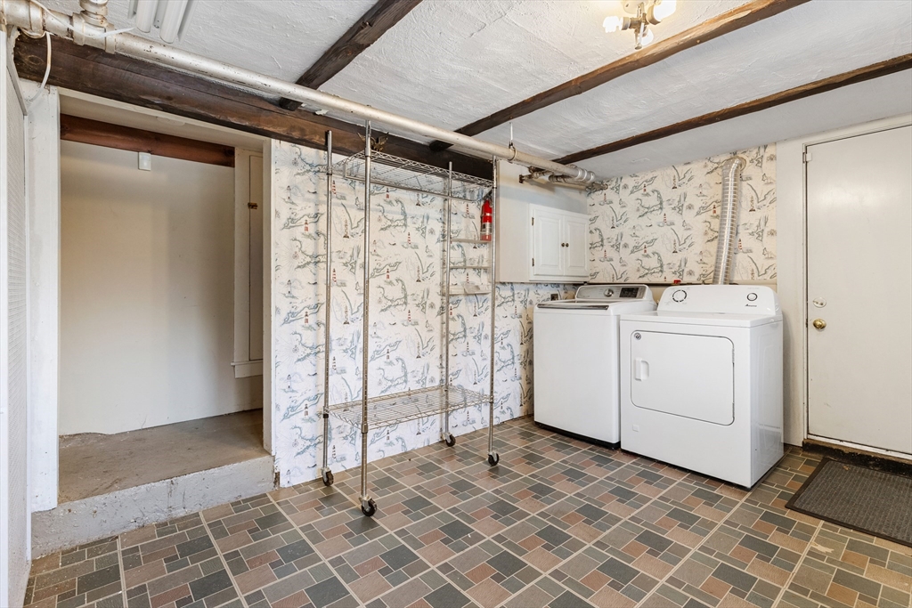 71 Woodland Road Malden, MA 02148 - Photo 33 of 41 a utility room with dryer and washer