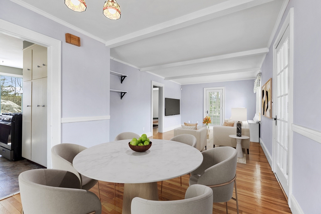 71 Woodland Road Malden, MA 02148 - Photo 8 of 41 a living room with furniture and wooden floor