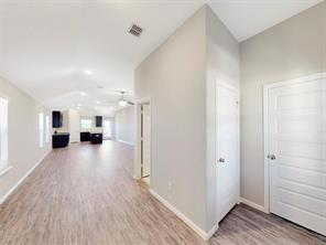 3421 Buster Way Corinth, TX 76210 - Photo 3 of 11 a view of empty room with wooden floor