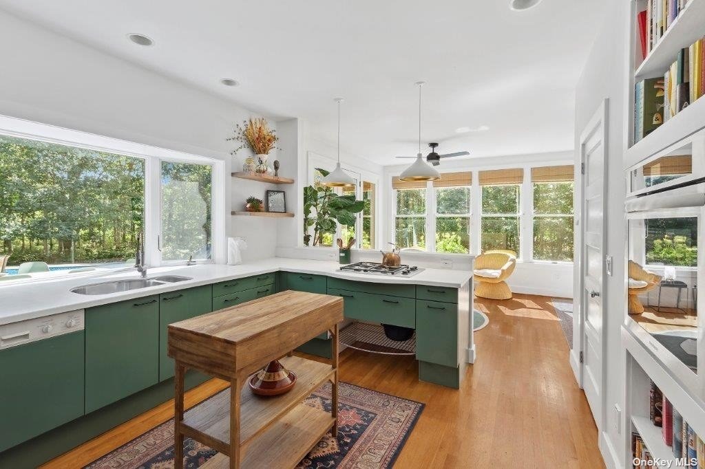 4 East Hampton, undefined 00000 - Photo 11 of 20 a view of a dining room with furniture window and outside view