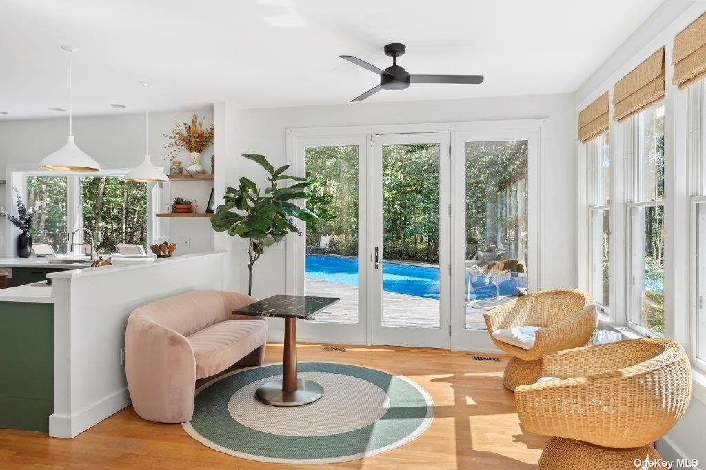 4 East Hampton, undefined 00000 - Photo 7 of 20 a living room with furniture and a large window