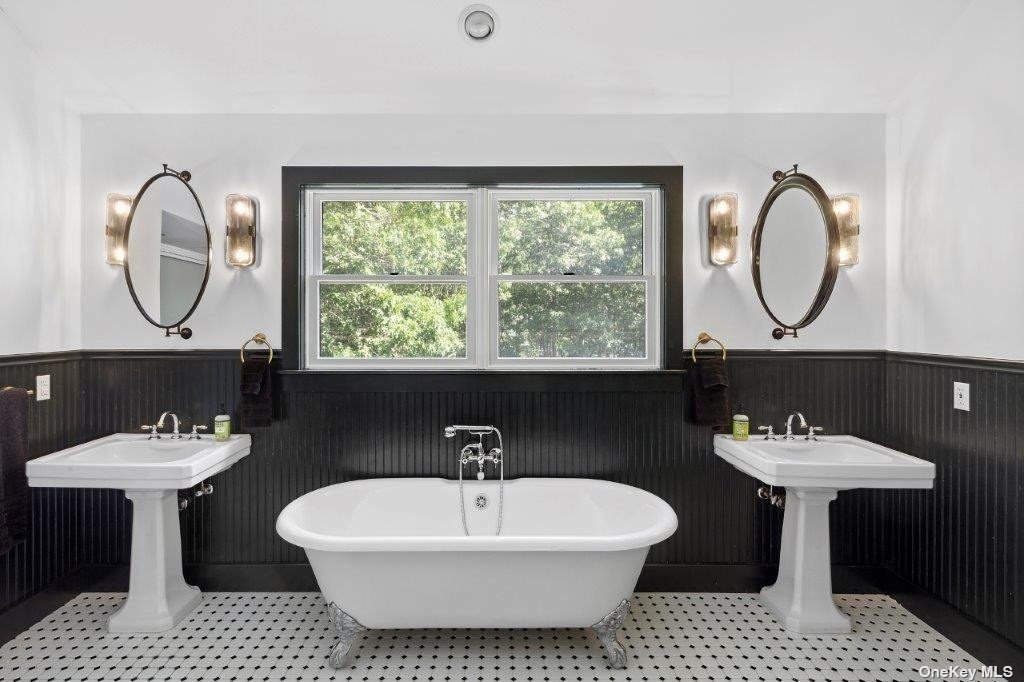 4 East Hampton, undefined 00000 - Photo 10 of 20 a bathroom with a sink and a mirror