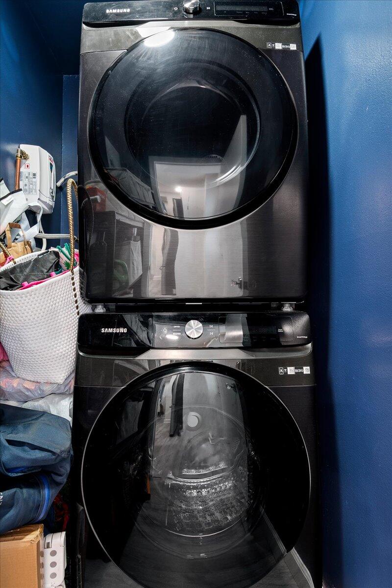 5301 Northwest 2nd Avenue, Unit PHH Boca Raton, FL 33487 - Photo 25 of 31 Inside Washer and Dryer