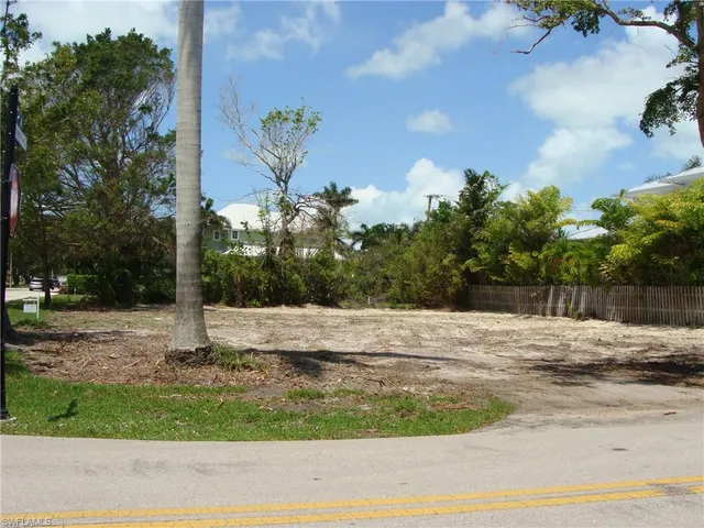 a view of a backyard of the house