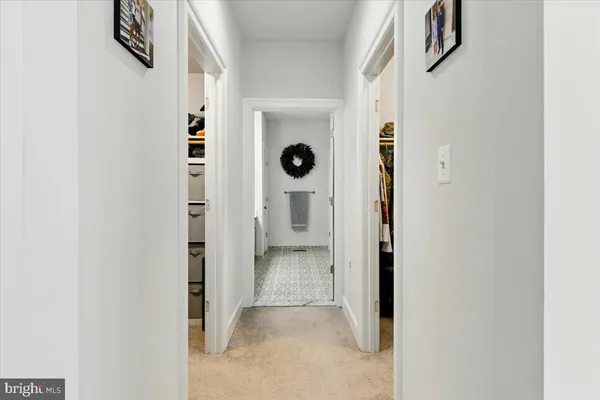 a view of a hallway with closet