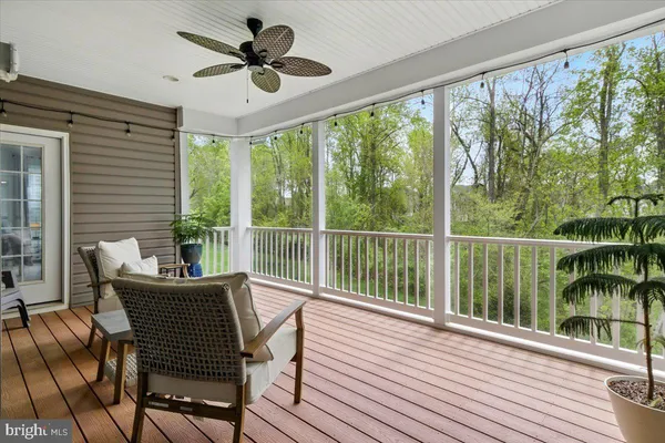 a view of a balcony with furniture