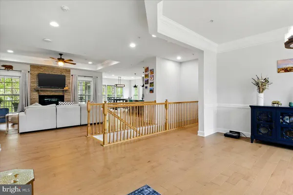 a view of a livingroom with furniture and a flat screen tv