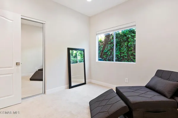 a view of livingroom with furniture and window