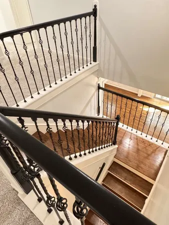 a view of an empty room with windows