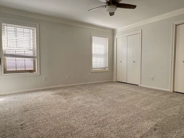 a kitchen with stainless steel appliances granite countertop a refrigerator and a stove