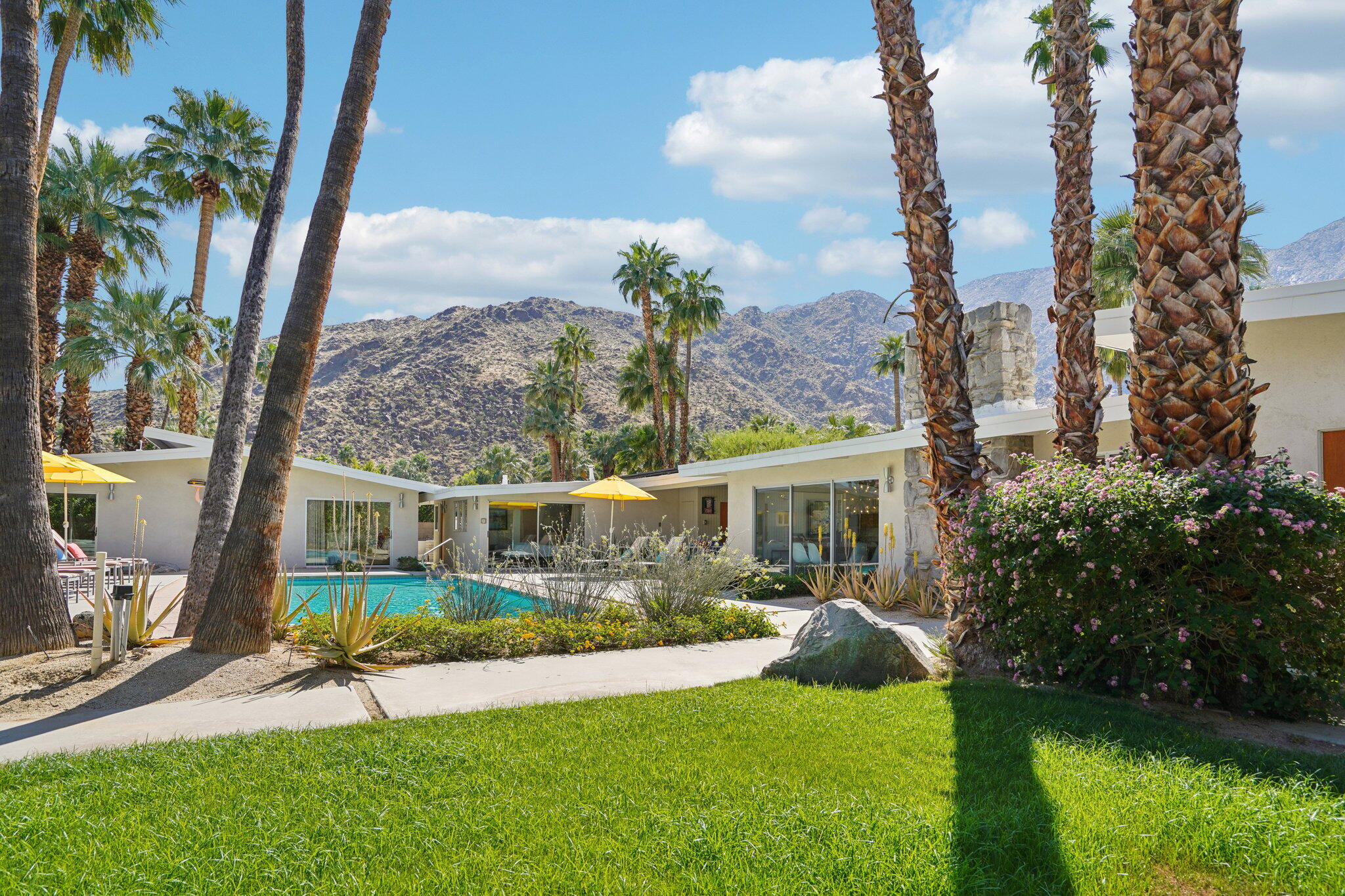 788 North Dry Falls Road Palm Springs, CA 92262 - Photo 53 of 97 a view of a house with a backyard porch and sitting area