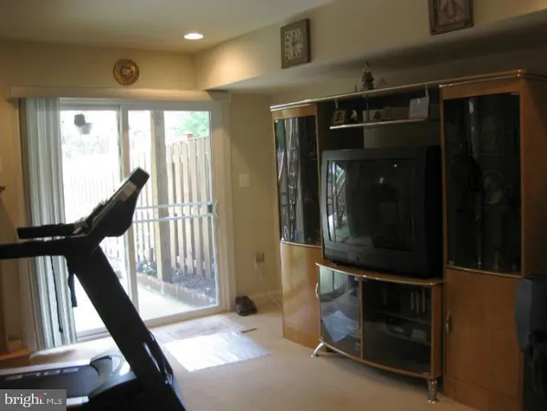 a view of an entryway with a door