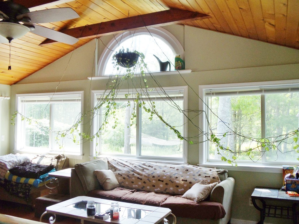 14 Naushon Road Wareham, MA 02576 - Photo 11 of 17 a living room with furniture and a large window