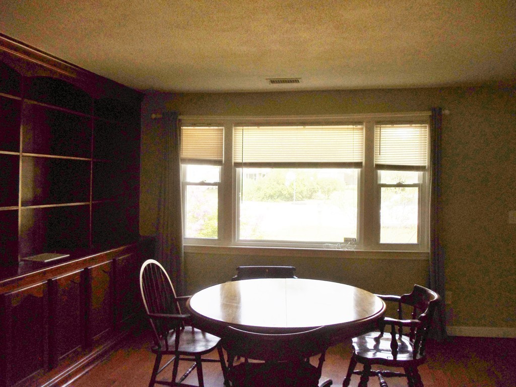 14 Naushon Road Wareham, MA 02576 - Photo 16 of 17 a view of a a dining room with furniture window and wooden floor