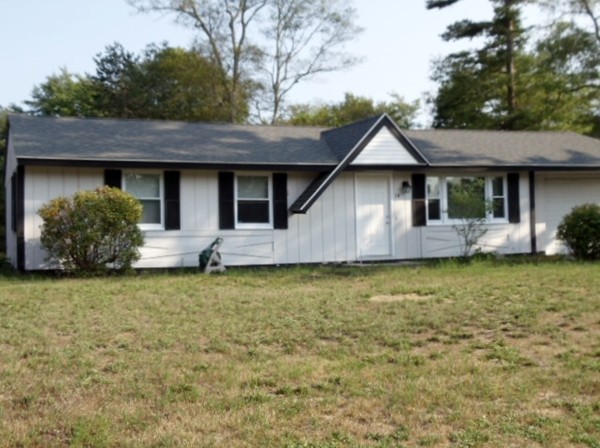 14 Naushon Road Wareham, MA 02576 - Photo 2 of 17 a front view of a house with garden