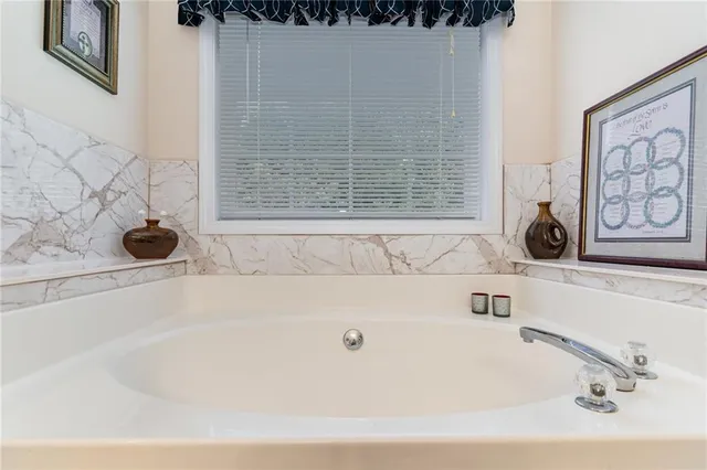 a bathroom with a bathtub
