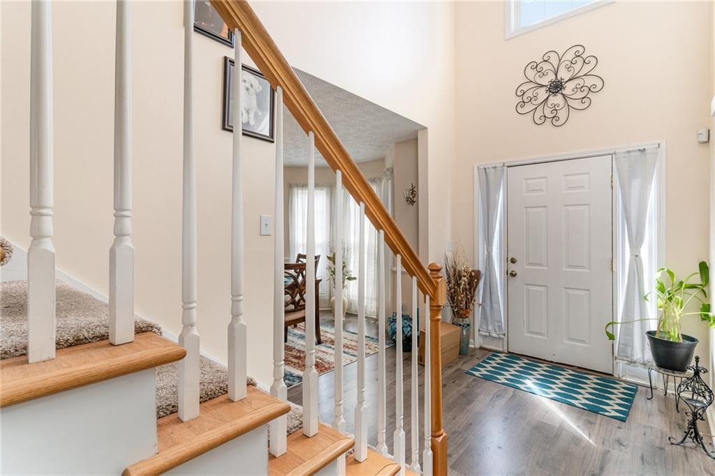 40 Cindy Circle Covington, GA 30016 - Photo 4 of 34 a view of front door with furniture and rug