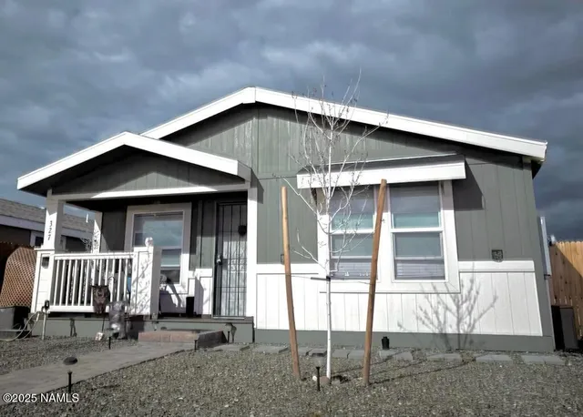 a front view of a house with porch