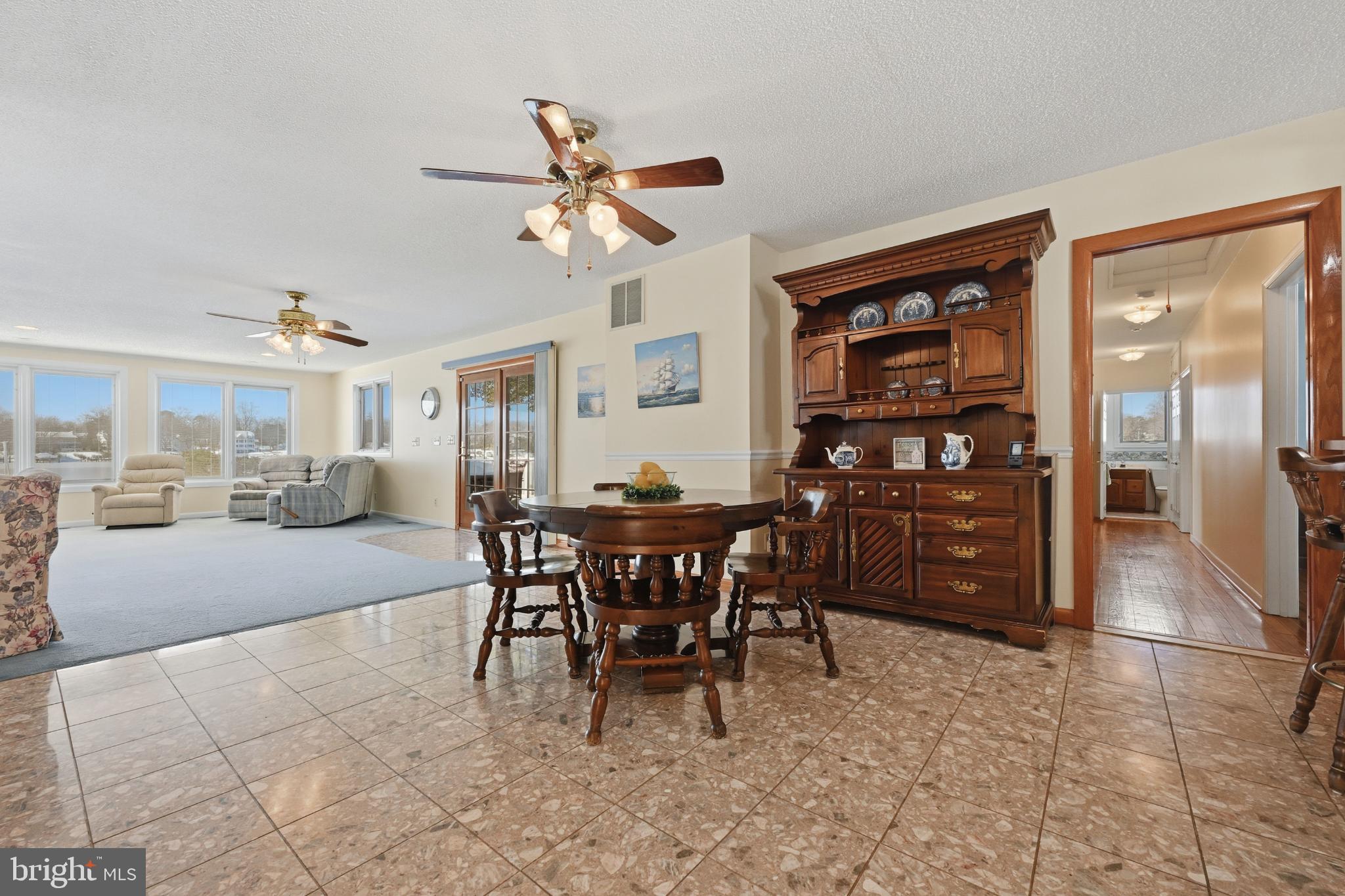 352 Riverside Drive Pasadena, MD 21122 - Photo 11 of 48 a view of a dining room with furniture