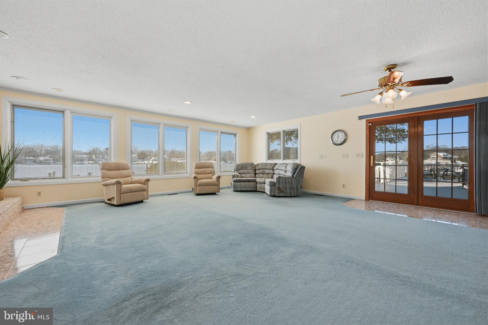 352 Riverside Drive Pasadena, MD 21122 - Photo 6 of 48 a living room with furniture and large windows