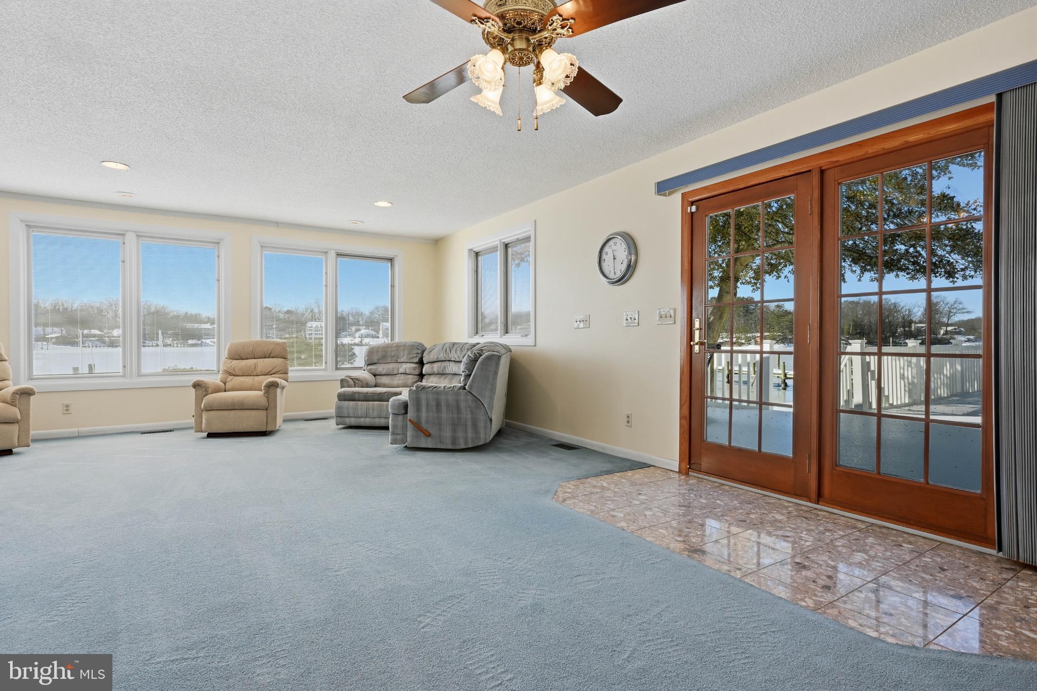 352 Riverside Drive Pasadena, MD 21122 - Photo 10 of 48 a living room with furniture and a large window