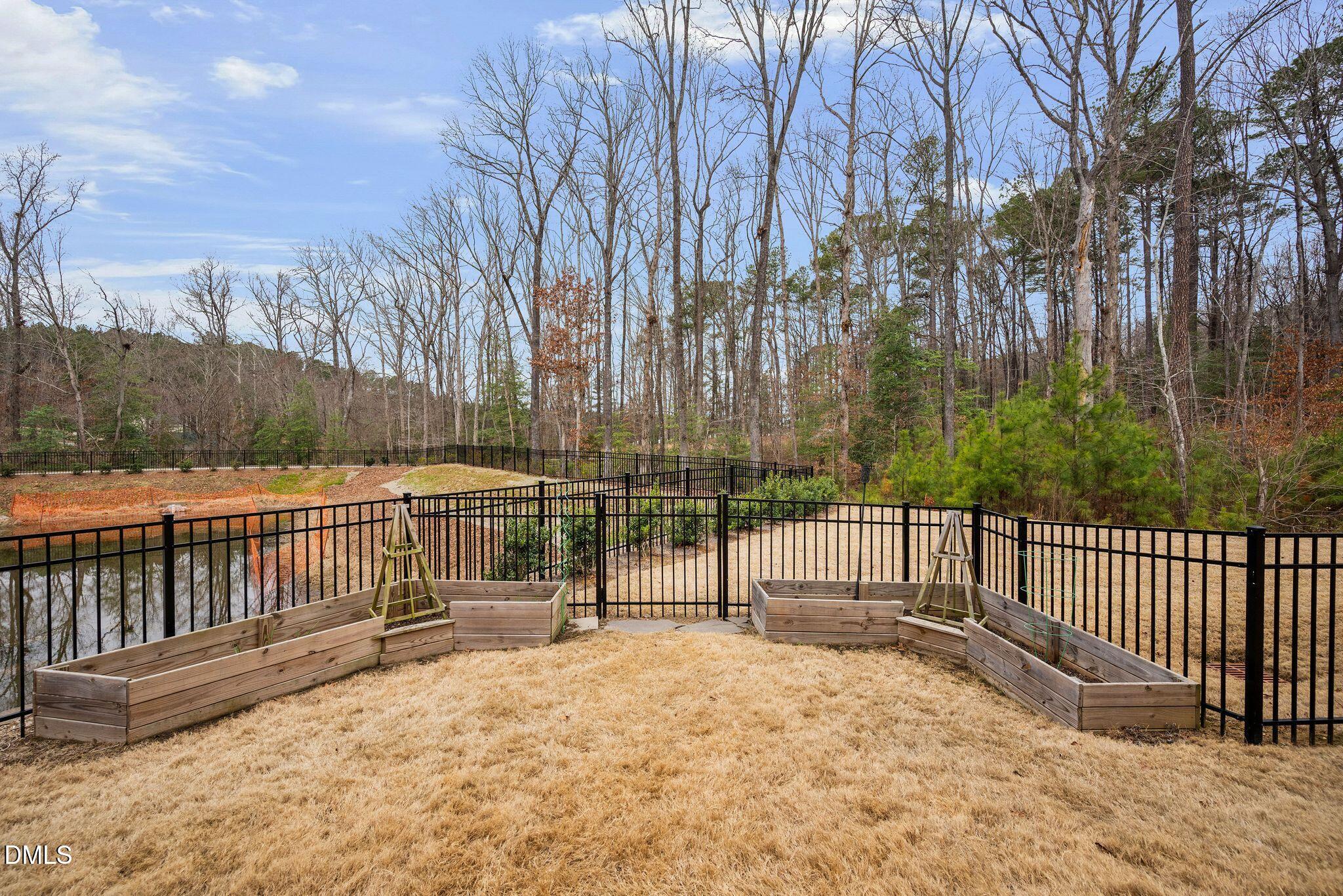 100 English Violet Lane Raleigh, NC 27610 - Photo 79 of 101 a view of pathway with a wrought fence