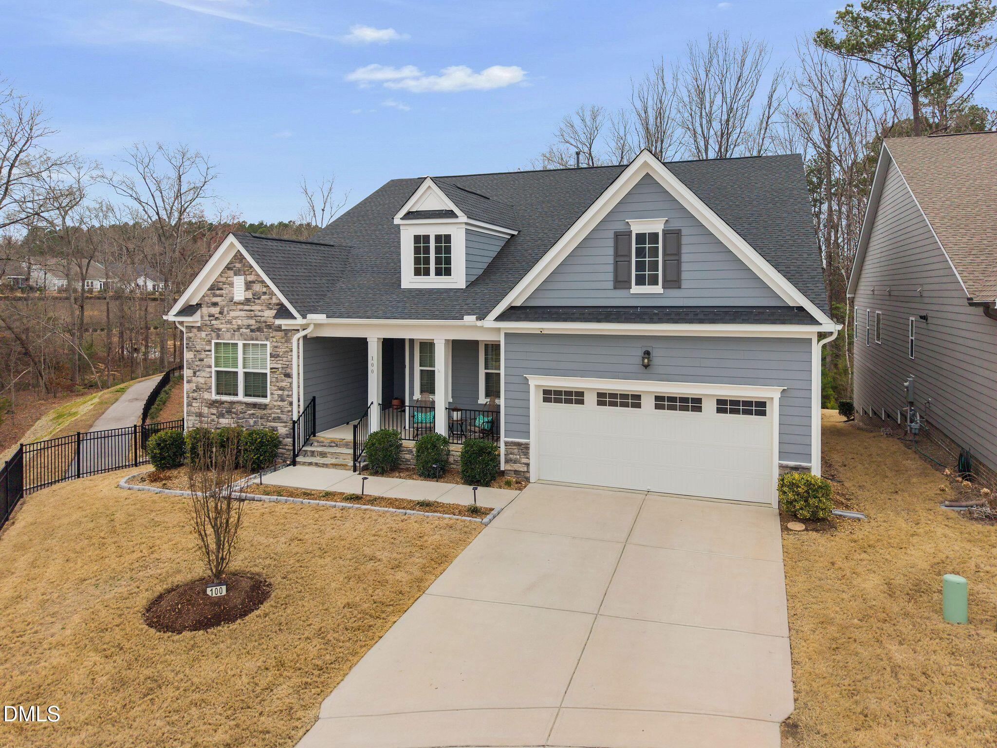 100 English Violet Lane Raleigh, NC 27610 - Photo 83 of 101 a front view of a house with yard